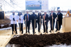 A group of Langston University representatives pose with hardhats and shovels at the Groundbreaking Ceremony for the new building for the School of Physical Therapy in 2015.